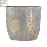 A small grey and gold ceramic planter with a textured metallic finish perfect as a gold ceramic planter option