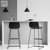 Black osmond nordic bar stools with sleek metal frames and minimalist seating for modern kitchen or bar spaces