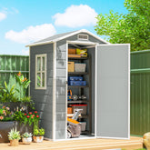 Gray plastic garden shed with white trim and open door showing organized shelves and tools inside light grey storage unit