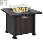 Black wicker outdoorsy pit table with burning flames glass screen glass beads rattan smokeless firepit heater