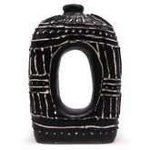 Black ceramic oval donut shaped vase with white geometric patterns and central oval opening for dry flowers