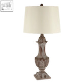 Paityn table lamp with distressed gray metal base and off-white linen shade for vintage style lighting