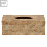 Beige stone seashell tissue box with textured natural surface and oval cutout for stylish tissue storage