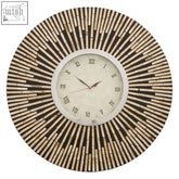 Palu black and natural shell wall clock with sunburst bamboo design and roman numerals on cream face shell wall clock