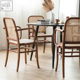 Brown cane and walnut wood paris g04 rattan dining chair with curved armrests perfect for stylish dining rooms