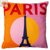 Vibrant paris needlepoint cushion with embroidered eiffel tower on orange and pink background with bold red paris lettering