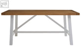 Parkside natural oak dining table with a light brown wooden top and white metal legs with x-shaped cross-brace design