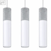 Three modern concrete pendant lamps borgio design with textured gray tops and smooth white glass light bulb covers