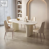 White marble oval dining table with fluted cream pedestal legs paired with peru dining chair in white