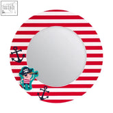A round pirate mirror with red and white stripes featuring a cartoon pirate and anchors to make small spaces feel larger