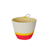 A vibrant 100% cotton planter basket with a white body and bold yellow and red stripes near the base