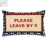 Cream needlepoint cushion with bold red text please leave by 9 and plush navy velvet geometric border