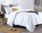 White duvet cover with soft wrinkles and subtle sheen made from pure egyptian cotton in plain white design