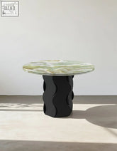 Quintero dining table round with polished green and white onyx top and black wavy sculpted base solid wood option