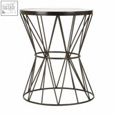 Black metal geometric side table with clear glass top featuring rabia corset base design for modern living space