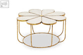 Gold-toned metal rabia petal coffee table with white marble flower-shaped top and oval mirrored base