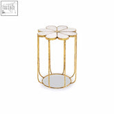 Gold-toned rabia petal side table with white marble flower-shaped top and gold wires circular base