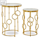 Gold-finished metal side tables from rabia set with circle pattern and clear mirrored tops perfect for living rooms