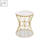 Gold wireframe rabia side table with pinched base white marble top and interlocking hoops design