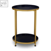 Sleek rabia two tier side table in navy blue enamel with gold accents and a lower shelf for extra storage