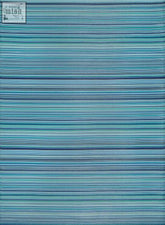 A rectangular rainbow outdoor rug with horizontal blue, teal, and green stripes perfect for outdoor use