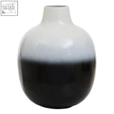 A sleek large black and white ombre ceramic vase with a smooth glossy finish perfect as a white ombre vase centerpiece