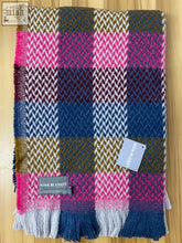 A vibrant multicolored random check celtic weave recycled wool throw 120cm x 150cm with herringbone pattern