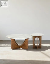 Minimalist oval coffee table with white marble top and sculpted walnut base for stylish living room shipping cost varies