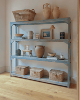 Weathered blue reclaimed metal shelving unit with rustic charm features three shelves for displaying decor items