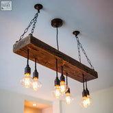 Rustic reclaimed wooden beam chandelier cluster pendant light with exposed filament bulbs perfect for client area use