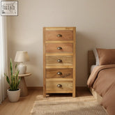 Light oak chest of drawers with five stacked drawers and dark bronze handles made from recycled teak wood