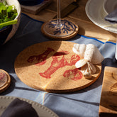 Round portuguese cork pot stand with red lobster design and seashells as decorative pot stands