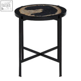 Black metal side table with relic petrified wood circular top featuring intricate beige and dark textured design
