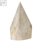Beige faceted relic petrified wood pyramid sculpture with pointed top and natural mineral veining