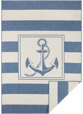 Reversible indoor-outdoor flatweave gandara rug with navy blue anchor and stripes on off-white nautical theme