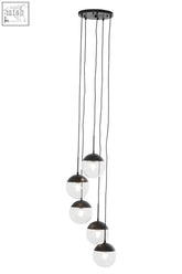 Modern black metal globe pendant light with five clear glass globes hanging in a cascading arrangement