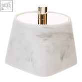 A sleek riviera cotton jar with a white marble effect base and gold-toned cylindrical stem for stylish storage