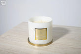 White cylindrical rosa blanco 3 wick luxury candle with gold base from li coh large candle collection rose bleu deco scent