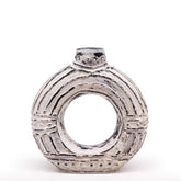 Silver ceramic round donut shaped vase with textured rings and dotted accents perfect for dry flowers