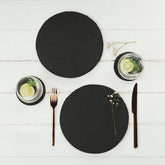 Black round slate place mats set of 2 with smooth matte finish perfect for stylish table settings