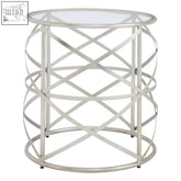 Silver metallic rubia side table with clear glass top and crisscross wireframe offers a convenient surface