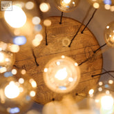 Rustic cascade chandelier with warm wooden spool and glass globe lights perfect for client area and stairwell lighting with lead time info