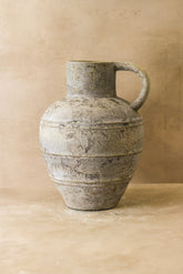 Rustic indonesian ceramic pot no 37 with a weathered gray finish, sturdy handle, and horizontal ridges