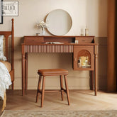 Warm brown cherry wood ryan dressing table with vertical slats glass-fronted cabinet and leather-topped stool