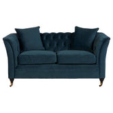 Deep navy velvet sabrina two seat sofa with tufted back rolled arms and ornate brass legs for stylish seating
