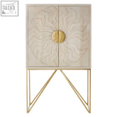 Sadras white wash mango wood cabinet with beige geometric sunburst doors and gold handles on slender metal legs