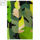 Safira botanical hair leather patchwork wall art with abstract green and black leaf-patterned textured rug design