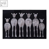Safira leather patchwork zebra wall art with black canvas and stylized white striped patchwork zebra designs