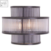 Salasco 3 tier black finish glass wall light with tiered cylindrical design and fluted clear glass rods in antique bronze