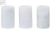 Three white marble tealight holders with subtle marbled texture in a set of three white marble candle holders